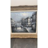 A contemporary picture of a city street scene by moonlight , in an ornate cream frame 78.5 x 89cm