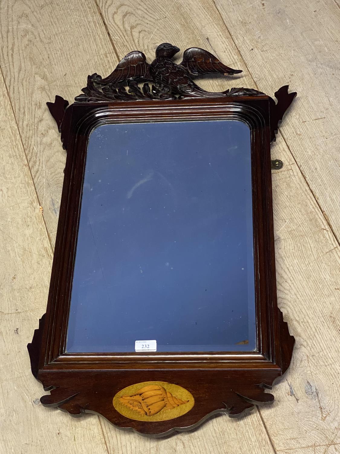 Mahogany and inlaid hanging wall mirror, with eagle finial, 87cmH