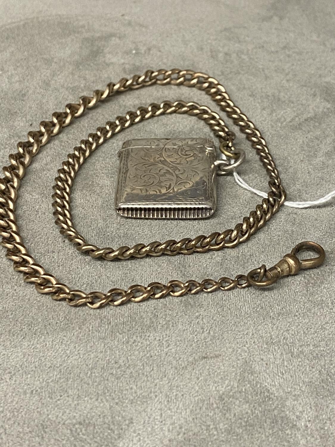 Stirling silver vesta case with chased decoration, Birmingham 1901, white metal curb link chain - Image 2 of 3