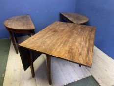 A D-end faded mahogany dining table, with a central drop leaf table as extra central leaves