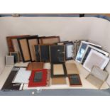 A quantity of decorative photo frames, wooden and silver plate style etc