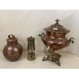 Large copper and brass samovar with ceramic handle, a large copper bowl, and a brass minors lamp The