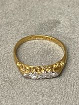 18 ct gold 5 stone diamond ring with a graduated line of old cut diamonds, 2.9g size ) approx