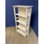 A modern white shelving unit, 124cm H