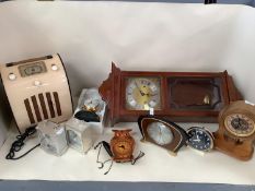 Collection of C20th carriage and mantle clocks, and a Metamack glazed wall clock, Vintage Bakelite