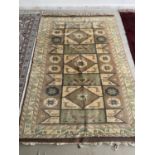 Rug in cream, brown, blue centre with cream borders, 140 x 212cm APPROX; with certificate: SINBAD