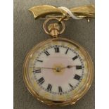 9 ct gold ladies pocket watch with pink white gilt enamel face, gilt hands, foliate engraved back (