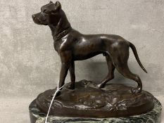 A bronze model of a Great Dane Dog, on an oval marble stand, 20 x 11 x 17cm