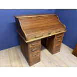 A good oak tambour front pedestal desk, with fitted interior