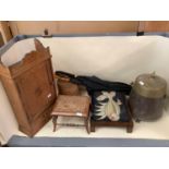 An inlaid hanging wall cupboard, a small footstool, with bergere - caning damaged, a foot stool