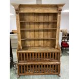 A good Irish large antique pine dresser, 3 shelves, above a galleried cupboard base, 214cm H x 133cm