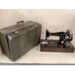 A vintage Singer Sewing Machine, see images for serial etc