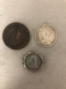 Three C19th coins, a George III 1797 cartwheel two pence, a Victorian Florin and a coin brooch