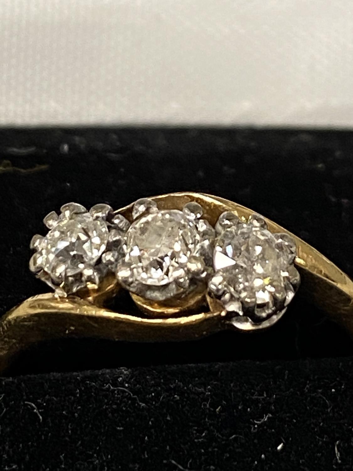 An unmarked yellow and white metal 3 stone diamond ring 3.9g, size Q approx - Image 3 of 3