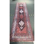Runner, pink brown colour with cream and red central diamond , 410 x 104cm