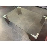 Designer Manhattan coffee table, with glass top raised on four Dark Oak legs H 45 W 140 D 75