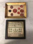 Small C18th sampler, dated march 3rd 1799; and framed collection of wax seals