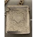 Stirling silver vesta case with chased decoration, Birmingham 1901, white metal curb link chain