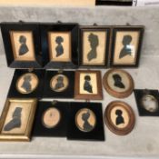 Large collection of C19th silhouette portraits in ebonised and glazed frames (approx12), see