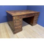 A good Edwardian mahogany 9 drawer partners desk, with brown inset leather top, 150L x 92W x 79H
