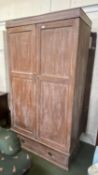 Modern 2 door wardrobe with drawer to base, in need of some restoration to back to reattach; hole