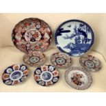 Japanese C19th scalloped edge Imari charger, 38cm diam, a prunus and bamboo blue and white charger