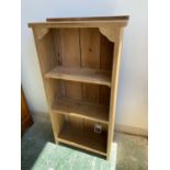 A blue painted bookshelf unit (147cmH), a pine bookcase (99cmH) and a shelving unit made of wine