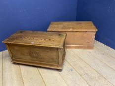 A pine and a light oak blanket box /toy chests, with rising lids(2), 1 handle missing