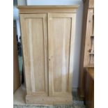 A pine two door wardrobe, with loose hanging pole rail, 188cmH x 92cm W approx.
