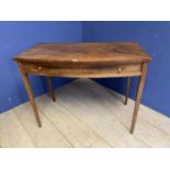 Faded mahogany side table with central drawer, and tapering legs103cm W