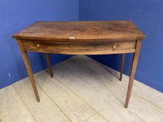 Faded mahogany side table with central drawer, and tapering legs103cm W