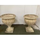 Similar pair of garden planters on stands, reconstitu