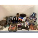 A large collection of copper and metal ware to include advertising tins, commemorative railway