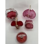 A collection of late C19th/early C20th cranberry glass to include serving baskets