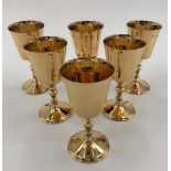 A set of six sterling silver gilt wine goblets by Walker and Hall, Sheffield, 1975 each 15cmH, 1250g