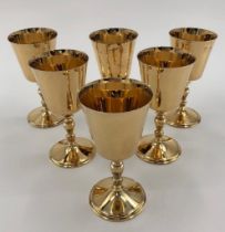 A set of six sterling silver gilt wine goblets by Walker and Hall, Sheffield, 1975 each 15cmH, 1250g
