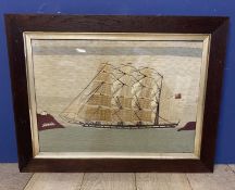Late C19th/earl C20th Crewel work image of a 3 masted ship in an oak and glaze partial gilt frame,