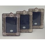 Trio of Sterling silver picture frames with pierced decoration by Keyfold Frames, Ltd, London