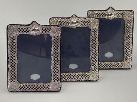 Trio of Sterling silver picture frames with pierced decoration by Keyfold Frames, Ltd, London