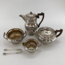 A sterling silver four piece tea set with half reeded design by William Robertson 1816, London,