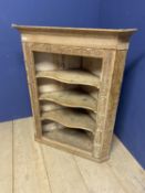 Pine corner shelf unit, with serpentine shaped shelves, and carved frieze to boarder, approx 110cmH,