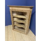 Pine corner shelf unit, with serpentine shaped shelves, and carved frieze to boarder, approx 110cmH,