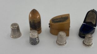 3 Sterling silver boxed thimbles, together with one loose sterling silver item, wooden etc