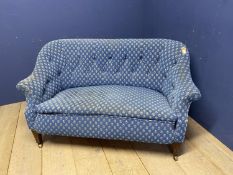 Howard style sofa, with reeded mahogany legs and brass castors, blue upholstery in need of a clearn,