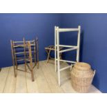 A quantity of vintage towel rails, luggage racks, bed tray, wicker laundry basket etc; all with