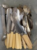 A collection of plated flatware