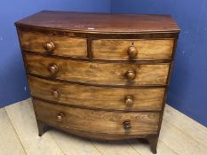 Victorian mahogany bow front chest of 2 short over 3 long drawers with wooden knob handles