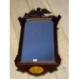 Mahogany and inlaid hanging wall mirror, with eagle finial, 87cmH and Pair of watercolours of