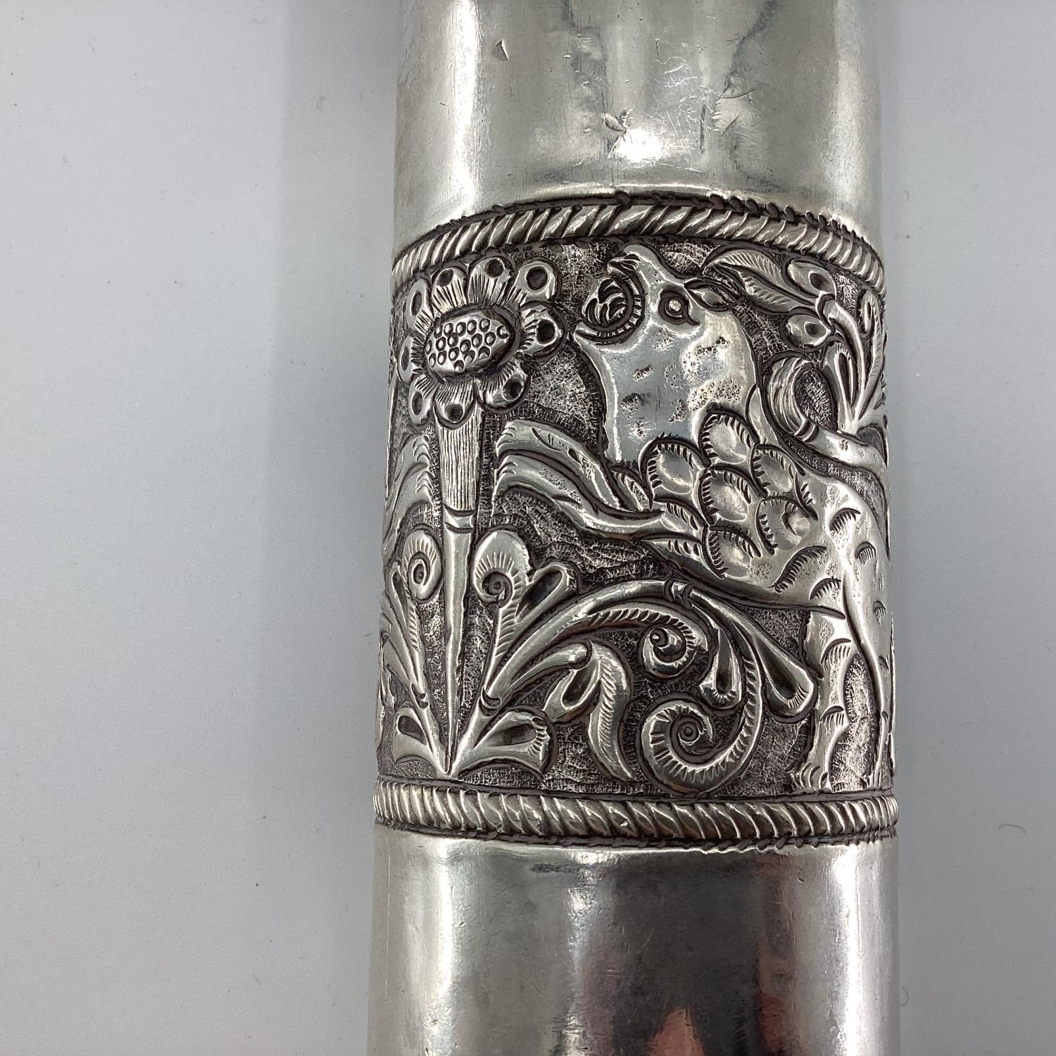 A Middle Eastern style white metal prayer scroll with raised flora and fauna decoration, 30cm, - Image 3 of 12