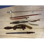 Collection of bladed weapons, to include a South Asian style sword in leather scabbard, am Indian